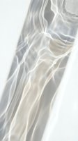 Translucent flowing fabric with soft light and shadow creating organic wave patterns, isolated on white background for design and overlay use.