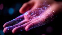 Glowing magical particles floating over outstretched palm against dark background with pink and purple light effects creating mystical atmospheric scene.