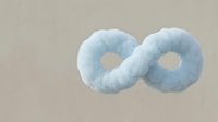 Soft blue infinity symbol made of fluffy cloud-like material on neutral background representing endless possibilities and eternal concepts.