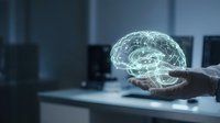 Young professional male holding glowing digital brain hologram in modern office environment, representing artificial intelligence, innovation, and technology solutions for business applications.