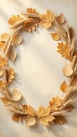 Autumn wreath made of golden wheat stalks and dried leaves creating oval frame on neutral background for seasonal decorations and harvest celebrations.