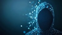 Mysterious digital silhouette made of glowing blue particles against dark background represents cybersecurity, hacking, or anonymous identity concept.