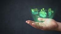 Digital finance technology concept with glowing green holographic icons floating above open palm showing calculator, money and payment symbols.