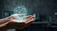 Hands holding glowing digital sphere with network connections and data visualization elements floating above palm in futuristic technology concept.