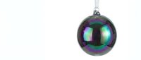 Iridescent Christmas ornament ball with rainbow metallic finish hanging on silver chain against white background for holiday decorations and festive designs.