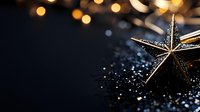 Golden star decoration with glitter on dark background, festive bokeh lights creating magical holiday atmosphere for Christmas or New Year designs.