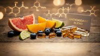 Natural antioxidant supplement capsules with fresh citrus fruits and blueberries on wooden surface with molecular structure background for health marketing.