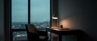 Modern workspace with minimalist desk, pendant lamp, and floor-to-ceiling windows overlooking cityscape at dusk. Contemporary office interior design for corporate, professional, and creative work environments.