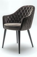Luxurious velvet dining chair with diamond tufted backrest and black wooden legs on white background, isolated furniture piece for interior design projects.