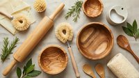 Eco-friendly kitchen utensils and natural cleaning tools arranged on neutral background for sustainable cooking and zero waste lifestyle.