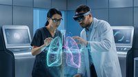 Two medical professionals examine a glowing holographic lung model in a futuristic lab, advancing healthcare with augmented reality technology.