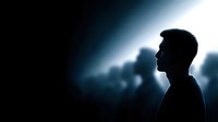 Male silhouette profile against bright light background with dramatic lighting effects for business presentations and motivational content.