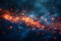 Magical glowing orange and blue bokeh lights on dark background create dreamy cosmic atmosphere. Abstract blurred particles flow across night sky backdrop.