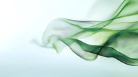 Ethereal green smoke waves flow gracefully against white background, creating delicate abstract curves and transparent layers in soft emerald hues.