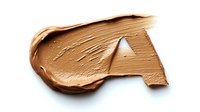 Creamy foundation makeup smear in letter A shape on white background, showing texture and consistency of cosmetic product for beauty and makeup design.
