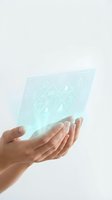 Hands holding holographic digital interface with geometric patterns and data visualization elements for futuristic technology concepts.