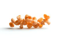 Fresh peeled mandarin orange segments arranged in row on white background, isolated citrus fruit pieces showing juicy pulp texture for food design.