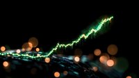 Glowing green financial chart line trending upward with blurred bokeh lights on dark background, representing market growth and success in trading.