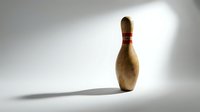 Wooden bowling pin with red stripe isolated on white background, casting shadow, ready for sports and recreation design projects.