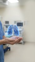 Doctor holding holographic lungs projection in modern medical facility showcasing respiratory health technology and pulmonology innovation.