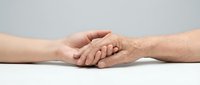 Young and elderly hands holding together showing intergenerational support, care and family connection on white background for healthcare concepts.