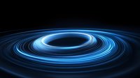 Glowing blue spiral light trails forming circular rings against black background, creating dynamic motion effect and futuristic technological atmosphere.