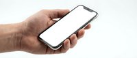 Male hands holding modern smartphone with blank white screen mockup isolated on white background for app presentation and mobile technology concepts.