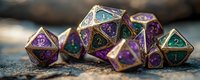 Metallic gaming dice with purple and green enamel details arranged on textured surface, featuring intricate geometric patterns and numbers for tabletop role-playing games.
