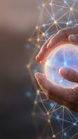 Hands holding glowing orb with digital network connections and light particles, representing technology, innovation, data connectivity, and future business solutions.