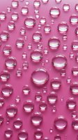 Clear water droplets of varying sizes scattered across a vibrant pink surface, creating a fresh and modern aesthetic suitable for skincare, cosmetics, and wellness product marketing.