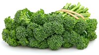 Fresh green broccoli florets bunch isolated on white background, raw organic vegetable with detailed texture and natural appearance for healthy eating concept.