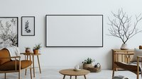 Minimalist scandinavian living room interior with blank frame mockup, wooden furniture, plants and natural decor elements on white wall background.