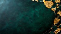 Luxurious emerald green and gold abstract background with metallic gold leaf fragments scattered along edges, creating elegant artistic composition for luxury designs.