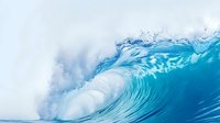 Powerful ocean wave curling with crystal clear turquoise water and white foam spray, dynamic motion capture of breaking barrel wave in sunlight, dramatic seascape.