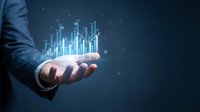 Businessman hand holding glowing blue bar chart with upward growth trend, representing financial success, data analysis, and business analytics for corporate presentations.