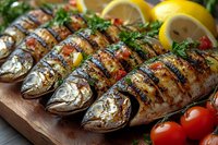 Grilled whole fish with herbs and lemon slices on wooden board, garnished with cherry tomatoes and fresh parsley for Mediterranean seafood cuisine preparation.