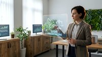 Professional businesswoman presenting legal framework concept with holographic display in modern office environment for corporate compliance training.