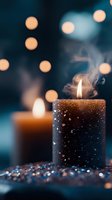 Glittery black candle with flame burning against bokeh lights background creating cozy atmospheric mood for relaxation and meditation.