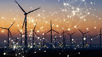 Smart wind farm with digital network connections at sunset showcasing renewable energy technology and sustainable power generation for modern infrastructure.