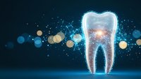 Digital tooth hologram with glowing particles and network connections on dark blue background for dental technology and healthcare innovation concepts.