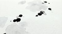 Abstract black ink blots and gray watercolor stains on white paper background for artistic design projects and creative layouts.