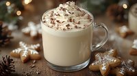 Creamy hot chocolate with whipped cream and chocolate shavings in glass mug surrounded by gingerbread cookies and pine cones for cozy winter holidays.