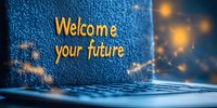 Glowing welcome message on laptop keyboard with bokeh lights and blue textured background creates inspiring technological atmosphere for business presentations.