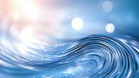 Flowing abstract wave pattern in soft blue tones with bokeh light effects and smooth curved lines creates serene aquatic mood for backgrounds and designs.