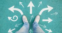 Person standing at crossroads with white directional arrows on turquoise ground showing multiple path choices for decision making and life direction concepts.