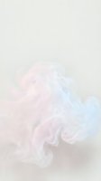 Soft pastel smoke and fog swirling in gentle waves against neutral beige background, creating dreamy ethereal atmosphere suitable for wellness, spa, and relaxation design projects.