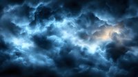 Dramatic stormy sky with dark blue turbulent clouds illuminated by moonlight breaking through, creating an atmospheric and moody natural backdrop.