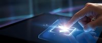 Businessman hand touching glowing light bulb icon on digital tablet screen, representing innovation, technology solutions, and smart business ideas for corporate applications.