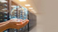 Hands holding glowing digital globe with network connections and data streams over server room background, representing global technology, cloud computing, and digital infrastructure solutions.