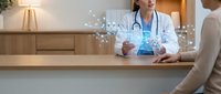 Female doctor in white coat consulting patient using futuristic holographic brain interface in modern clinic, showcasing AI-powered medical technology.